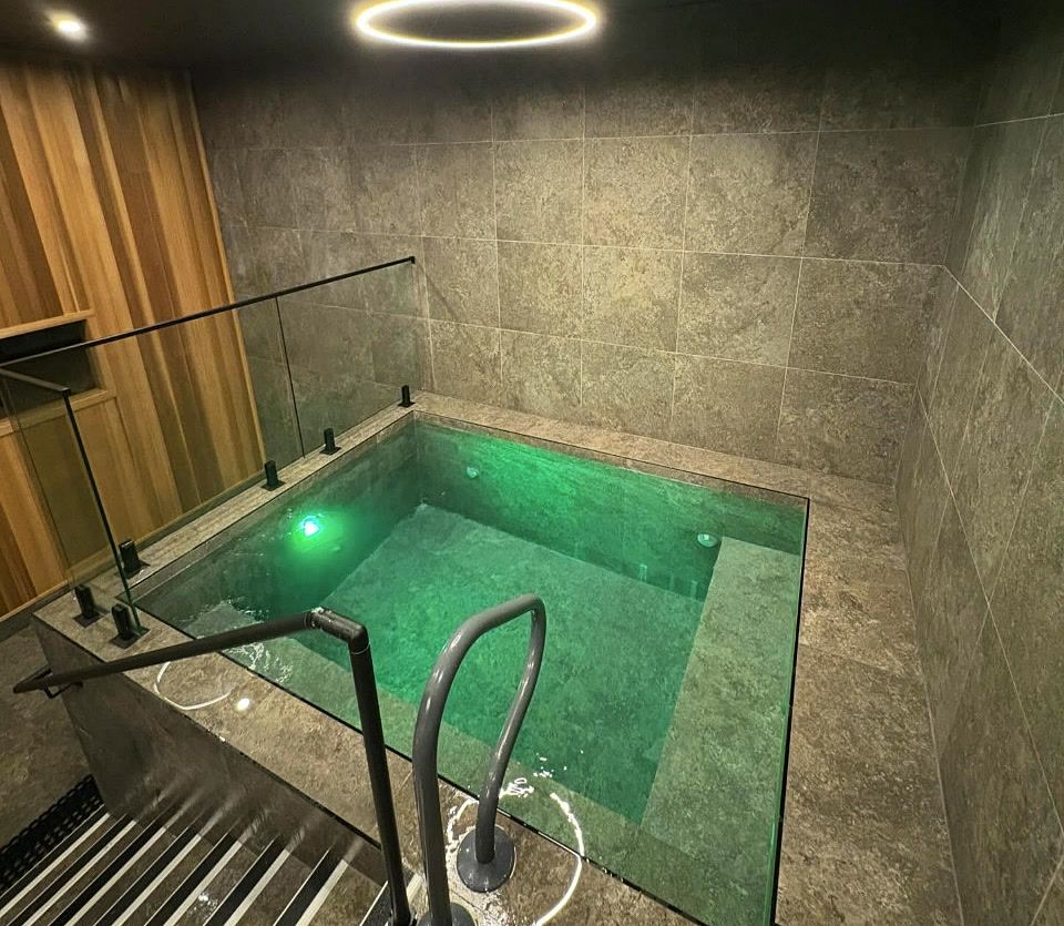 A custom formed concrete plunge pool
